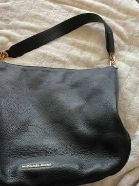 Michael Kori’s black leather